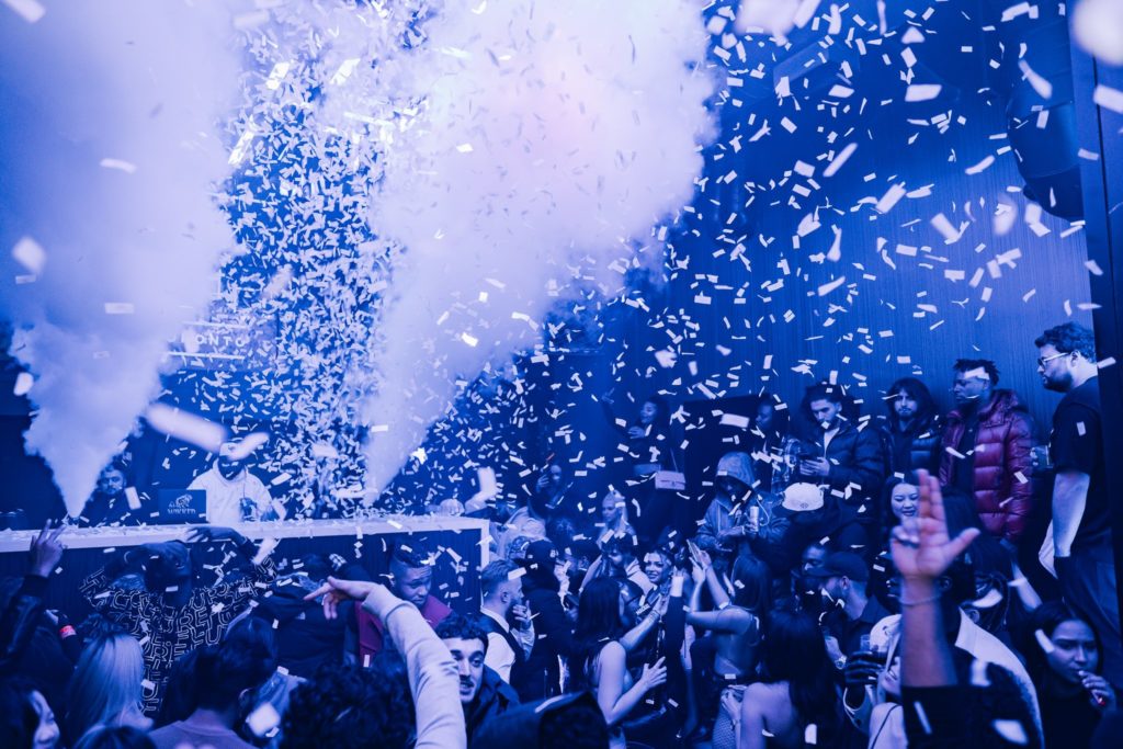 44 Toronto confetti pours over a lively crowd as the DJ brings the heat