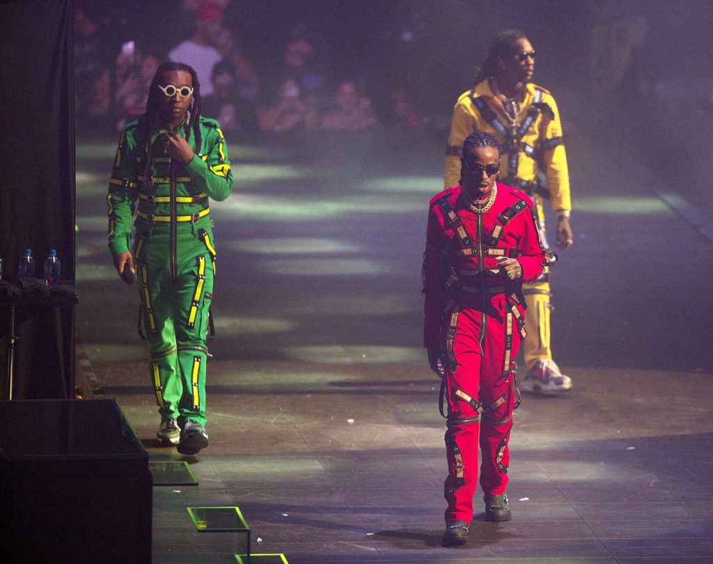 The MIGOS in matching outfits during the Aubrey and the Three AMigos tour in 2018
